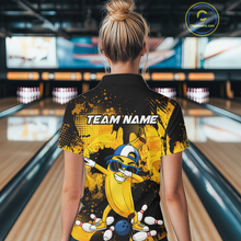 Load image into Gallery viewer, Woman wearing a black and yellow bowling quarter zip featuring a cool banana mascot dabbing, bowling pins, a blue bowling ball, and custom team name text.