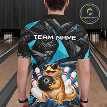 Load image into Gallery viewer, Men’s turquoise bearded dragon bowling polo shirt, back view on male model in bowling lane 