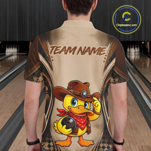 Load image into Gallery viewer, Person wearing a bowling shirt with a cartoon duck character and 'Team Name' text in a bowling alley.