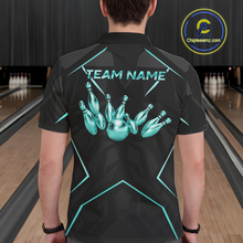 Load image into Gallery viewer, Person wearing a black bowling shirt with teal design and 'Team Name' text in a bowling alley.