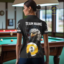 Load image into Gallery viewer, Woman wearing a black shirt with an american flag eagle 9 ball and pool ball design, standing in a bar.