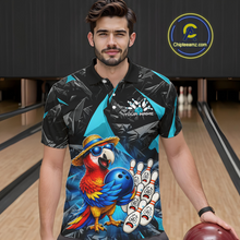 Load image into Gallery viewer, Man wearing a colorful bowling shirt with a parrot design in a bowling alley.