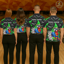 Load image into Gallery viewer, Four people wearing bowling shirts with colorful parrot designs and 'Team Name' text on a bowling alley.