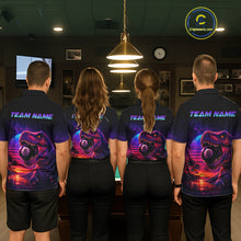 Load image into Gallery viewer, Four people wearing matching shirts with a dinosaur and number 8 design in a room.