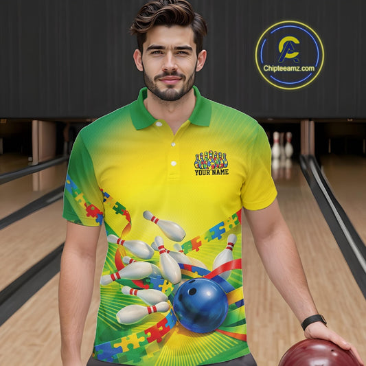 Male model in a bowling lane wearing green and yellow polo shirt, front view featuring autism puzzle bowling ball and pins illustration