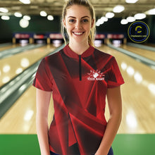 Load image into Gallery viewer, Woman wearing a red and black bowling shirt with a logo and text in a bowling alley.