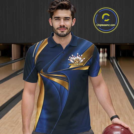 A man wearing a custom bowling shirt in navy blue and gold, standing in a bowling alley. The shirt features a custom text on the left chest