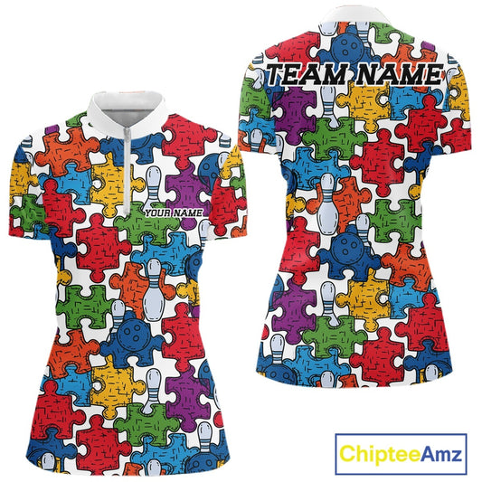 Front and back views of a short-sleeve polo shirt with a colorful bowling-themed jigsaw puzzle pattern on a white background. The shirt features a white collar, a short white zipper at the neck, and customizable text placeholders 'YOURNAME' on the front and 'TEAM_NAME' on the back.