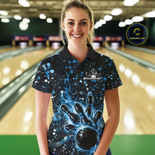Load image into Gallery viewer, Female model wearing a black bowling polo shirt at the bowling lane with blue music-inspired splatter details and bowling artwork.