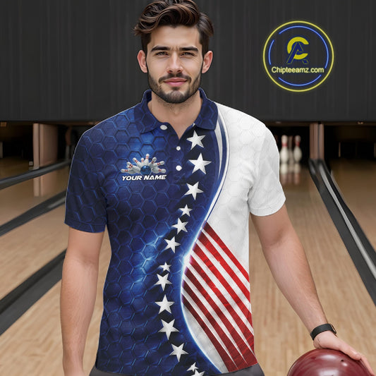 A man wearing a custom short-sleeve polo shirt with an American flag-inspired design, standing in a bowling alley. The shirt features a blue honeycomb pattern with white stars on one side and a white side with red and white stripes on the other.