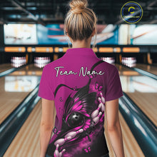 Load image into Gallery viewer, Back view of a female model in a bowling venue wearing a pink and black polo shirt featuring a butterfly and bowling-themed graphics.