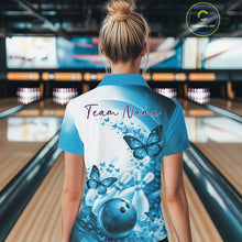 Load image into Gallery viewer, Back view of a female model wearing a blue bowling quarter zip with butterfly graphics and bowling-themed artwork