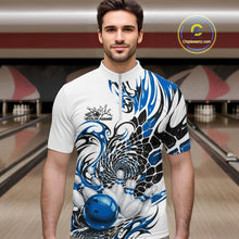 Load image into Gallery viewer, White bowling quarter-zip shirt on a male model, showcasing blue and black tribal motifs and a glossy blue bowling strike design
