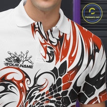 Load image into Gallery viewer, Detailed left chest view of a white bowling polo shirt featuring orange and black tribal motifs and honeycomb-inspired textures