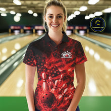 Load image into Gallery viewer, Female model wearing a black and red bowling polo at the bowling lane with fiery bowling action graphics.