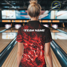 Load image into Gallery viewer, Back view of a womens black and red bowling polo showcasing a bowling strike scene with flames and patriotic accents.