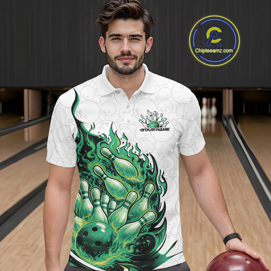 Front view of a male model in a bowling venue wearing a white and green bowling polo with fiery bowling graphics.