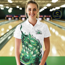 Load image into Gallery viewer, Female model in bowling lane wearing polo shirt with flaming bowling ball crashing into pins white and green fiery sports design