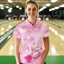 Load image into Gallery viewer, Female model in bowling lane wearing polo shirt with flaming bowling ball striking pins blue dynamic fire design