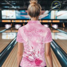Load image into Gallery viewer, Back view female model wearing polo shirt with flaming bowling ball crashing into pins blue fiery bowling artwork