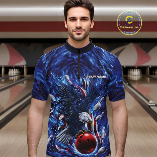 Front view male model at the bowling lane wearing a bowling quarter zip shirt with eagle motif, bowling ball, flag details, and pins.