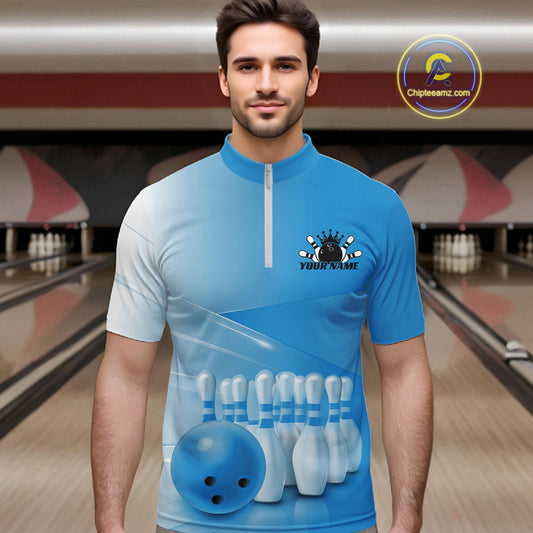 Male model front view at the bowling lane wearing a bowling quarter zip shirt with bowling ball and pins across a pink gradient design.