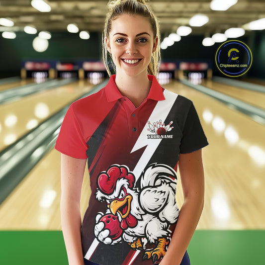A woman wearing a custom bowling shirt with a red, black, and white design featuring a cartoon rooster mascot, standing in front of a blurred bowling alley background.