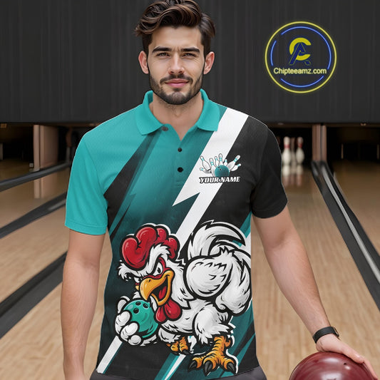 A man in a bowling alley wearing a custom printed short-sleeve polo shirt with a teal, black, and white design featuring a cartoon rooster mascot and the text 'YOURNAME'.