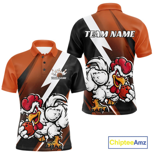 Custom short-sleeve polo shirt shown from the front and back, featuring a black and orange diagonal split design with white lightning accents and a large cartoon rooster holding red heart-shaped balls. The front has a small custom logo area and the back has 'TEAM NAME' printed across the shoulders.