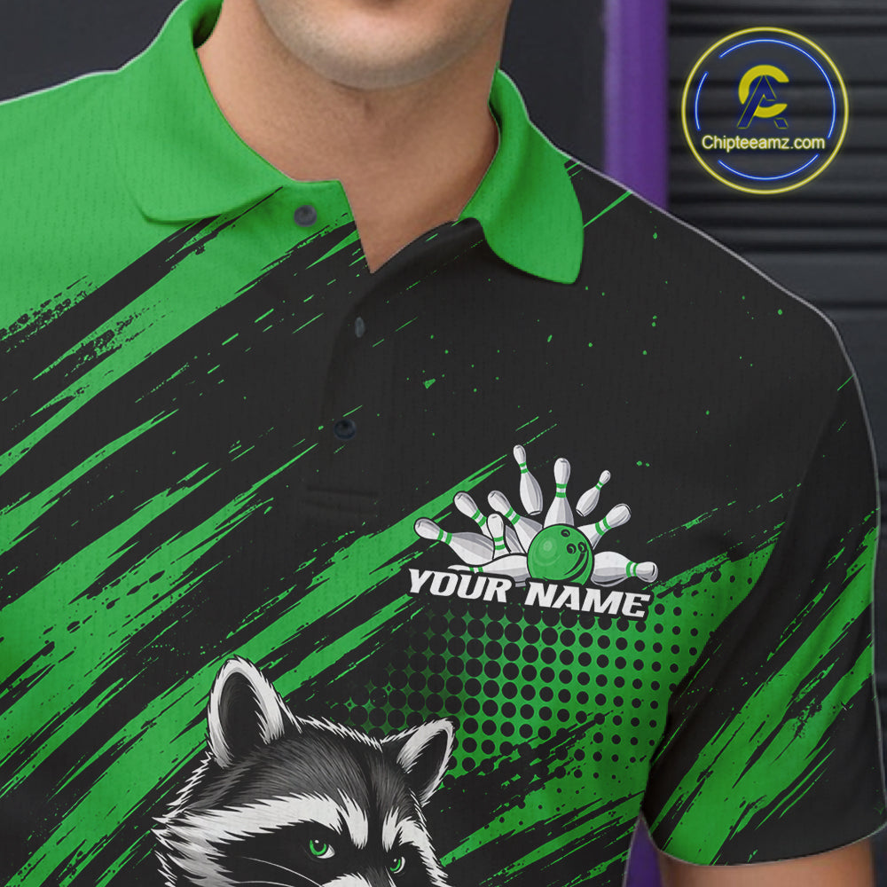 A close-up of a person wearing a green and black bowling-themed polo shirt with a raccoon graphic and a bowling pin/ball design with the text 'YOUR NAME'.