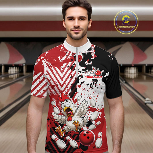A man wearing a short-sleeve bowling-themed graphic t-shirt with a red, black, and white design featuring a cartoon chicken and bowling pins, set against a bowling alley background.