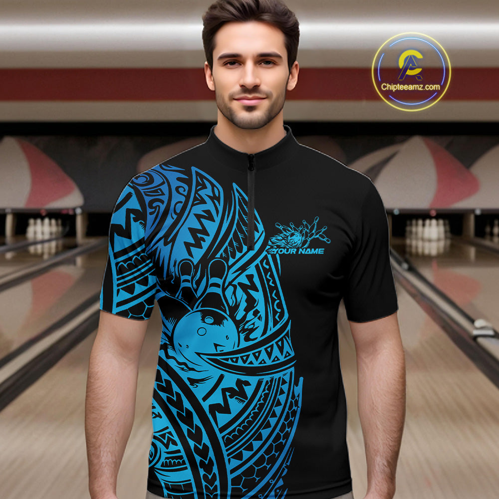 Male model wearing a black and blue bowling quarter-zip shirt at the bowling lane with Polynesian-inspired bowling details.