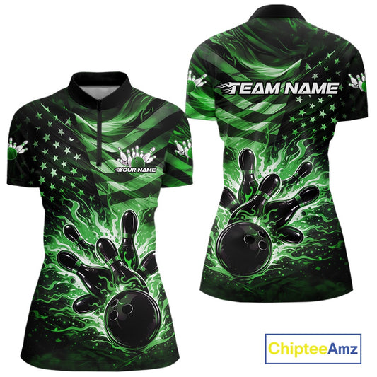 Front and back views of a black womens bowling quarter-zip shirt featuring a green flame bowling ball striking pins with a distressed American flag theme.