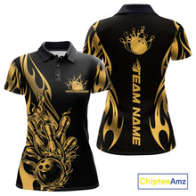 Load image into Gallery viewer, Front and back view mockup of a women’s black polo shirt featuring a golden metal tribal flame design with a bowling ball striking pins in a premium sports style.