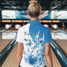 Load image into Gallery viewer, Back view of a female model wearing a white and blue bowling quarter zip with butterfly artwork and bowling graphics