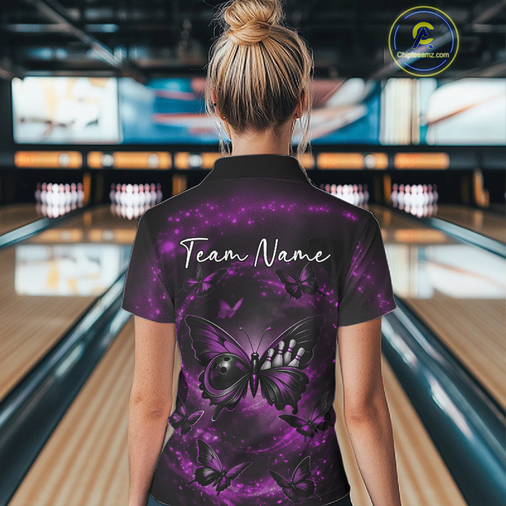 Back view of a female model in a bowling venue wearing a quarter-zip bowling shirt with a purple and black butterfly and smoky bowling-themed artwork.