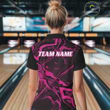 Load image into Gallery viewer, Back view of a womens black and pink bowling polo showcasing angular geometric pattern details.