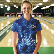 Load image into Gallery viewer, Female model in a bowling alley wearing a polo with blue bowling ball artwork and fiery bowling graphics.
