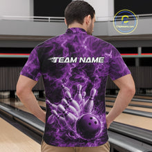 Load image into Gallery viewer, Front view of a mens bowling quarter-zip showcasing a purple bowling ball hitting pins with a dramatic flame background.