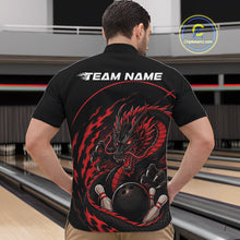 Load image into Gallery viewer, Back view of a male model in a bowling alley wearing a red custom quarter-zip bowling shirt featuring an aggressive dragon with flames in a dynamic and energetic design.