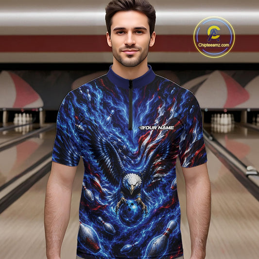 Male model front view in a bowling lane wearing a quarter zip shirt with eagle graphics, bowling ball, flowing flag accents, and pins.