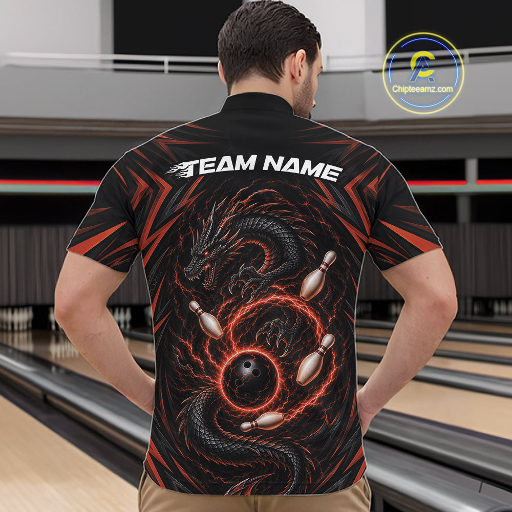 A male model wearing a black and orange lightning dragon bowling-themed shirt with 'TEAM NAME' text at a bowling alley.