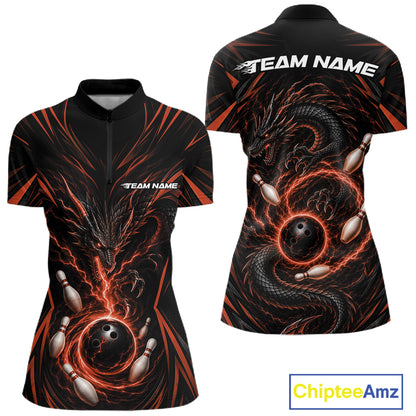 Front and back views of a women's short-sleeve bowling jersey in black with a orange and dark gray dragon design wrapping around bowling balls and pins, with 'TEAM NAME' printed on the chest and back. 