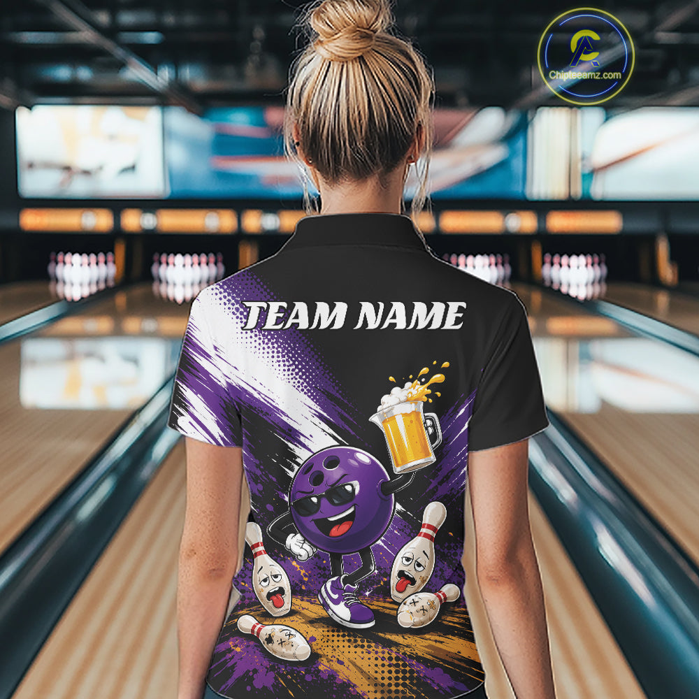A woman viewed from behind wearing a black short-sleeve bowling polo shirt with a colorful purple and black graphic design on the back. The shirt features the text 'TEAM NAME' and a cartoon bowling ball character.