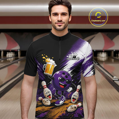A man wearing a custom bowling-themed short-sleeve quarter-zip shirt with a purple and black graphic design featuring a cartoon bowling ball and pins, set against a blurred bowling alley background.
