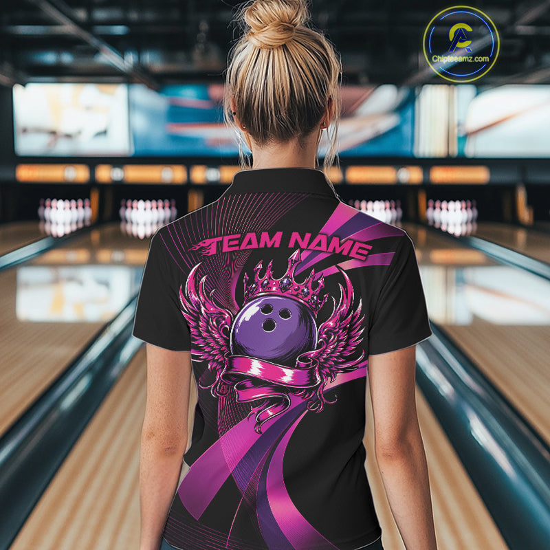 Person wearing a bowling shirt with a purple design and 'Team Name' text in a bowling alley.