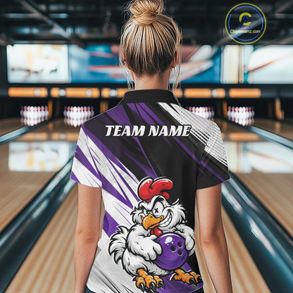 A woman viewed from behind wearing a custom bowling shirt in a bowling alley. The shirt features a black collar, purple and white graphic stripes, and a cartoon rooster holding a purple bowling ball.