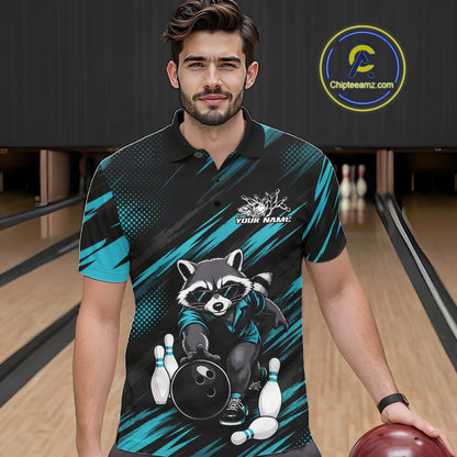A man wearing a custom bowling polo shirt with a raccoon graphic, standing in a bowling alley. The shirt features a black and teal pattern with a cartoon raccoon holding a bowling ball and pins.