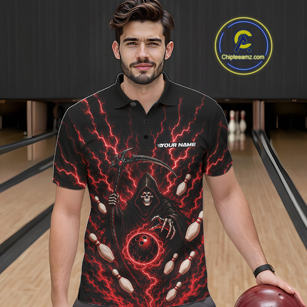 A man wearing a black short-sleeve polo shirt with a red and black grim reaper graphic, standing in a bowling alley holding a bowling ball. The shirt features a scythe, lightning bolts, bowling pins, and the text 'YOUR NAME'.