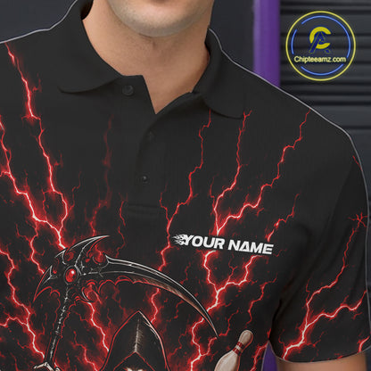 A close-up of a person wearing a black short-sleeve polo shirt with a red lightning bolt graphic and a grim reaper design. The shirt has a white 'YOUR NAME' text placeholder on the chest 